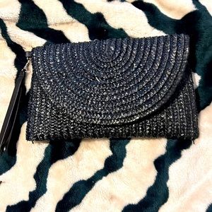 Cute clutch or wristlet bag. Black